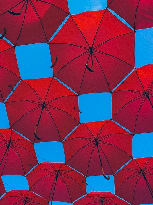 Babel Banking Santander. United umbrellas seen from below