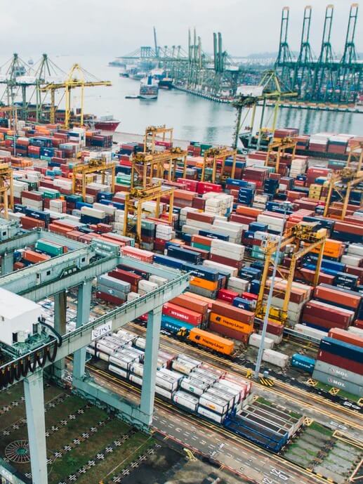 Babel Industry & Retail. Aerial shot of a shipyard full of containers